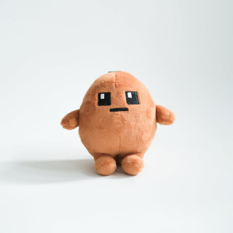 Potatoz plush toy with a simple face on a white background
